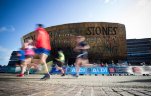 06.10.19 - Cardiff Half Marathon 2019 - Runners make their way through Cardiff Bay, Roald Dahl Plas and past the Wales Millennium Centre at the halfway point of the race