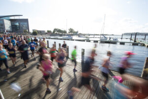 06.10.19 - Cardiff Half Marathon 2019 - Runners make their way through Cardiff Bay, Roald Dahl Plas and past the Wales Millennium Centre at the halfway point of the race