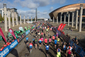 06.10.19 - Cardiff Half Marathon 2019 - Runners make their way through Cardiff Bay, Roald Dahl Plas and past the Wales Millennium Centre at the halfway point of the race