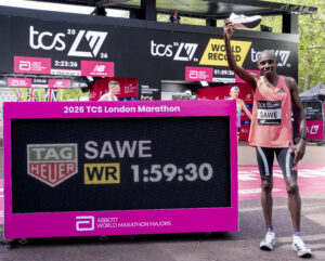 Sabastian Sawe (KEN) celebrates breaking the Marathon World Record in under two hours with an official time of 01:59:30 after crossing the finish line to win the Elite Men Race during the TCS London Marathon on Sunday 26th April 2026.


Photo: Bob Martin for London Marathon Events

For further information: media@londonmarathonevents.co.uk